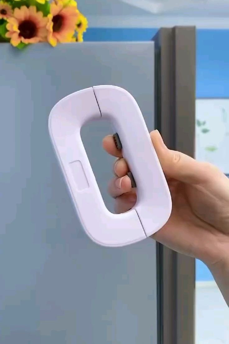 Umar Mart fridge lock with keys, made of durable ABS plastic, securing kitchen appliances and preventing access by children.