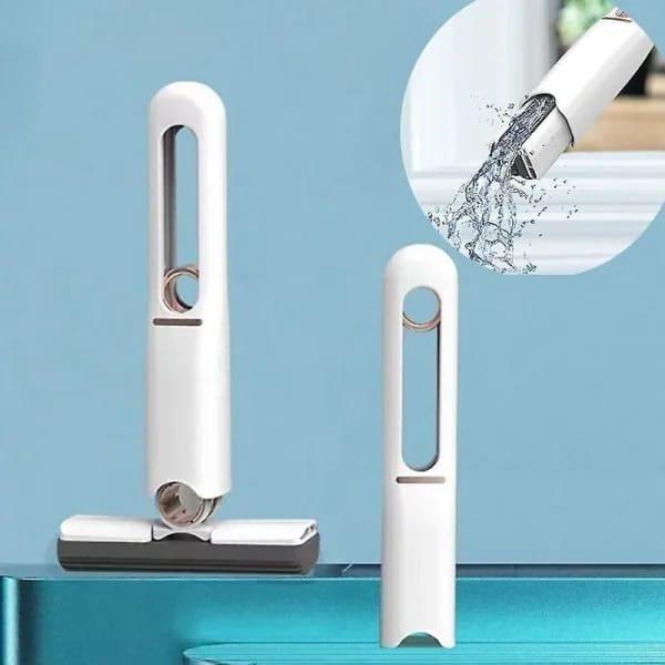 Portable mini self-squeeze mop by Umar Mart, compact home cleaning accessory with adjustable handle and easy squeeze mechanism.